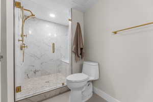 Master bathroom with extra large walk in shower, Kohler fixtures and bench