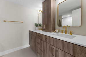 Spa-like master bath with Kohler fixtures and custom cabinetry