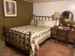 Bedroom featuring carpet floors
