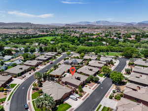 Aerial view of residential area with a mountain backdrop