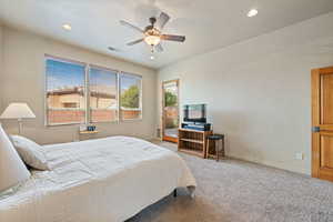 Carpeted bedroom with access to exterior, a ceiling fan, and recessed lighting