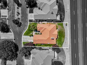 Aerial view of property and surrounding area with property boundaries highlighted