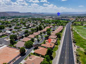 Aerial view of residential area with a mountain backdrop