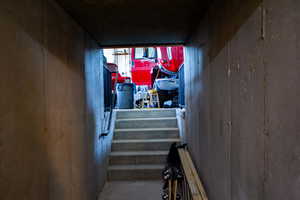 Staircase with concrete flooring
