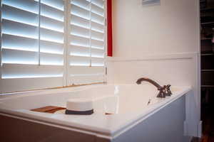 Bathroom featuring a garden tub