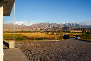 View of mountain backdrop with rural landscape