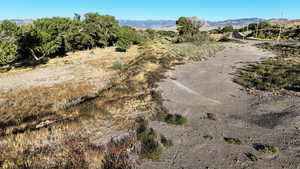 View of mountain backdrop featuring rural landscape