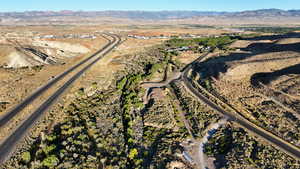 Aerial view of property's location with mountains