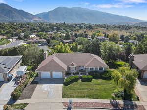Aerial view of residential area with a mountain backdrop