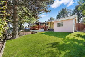 View of yard featuring a deck