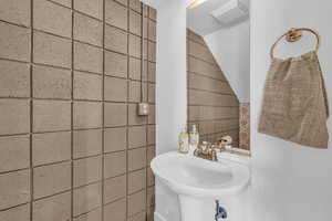 Bathroom with tile walls