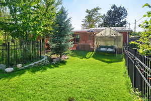 View of fenced backyard