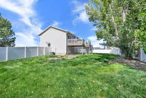 View of yard with a deck