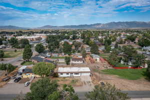 Aerial view of residential area with a mountain backdrop