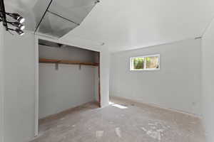 Unfurnished bedroom featuring a closet