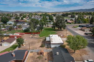 Aerial view of residential area with a mountainous background