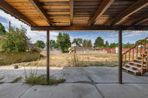 View of patio featuring a playground