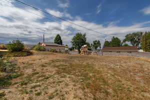View of yard with a playground