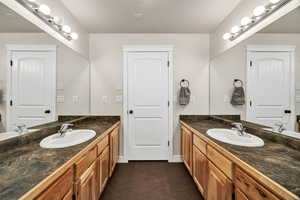 Full bath with two vanities