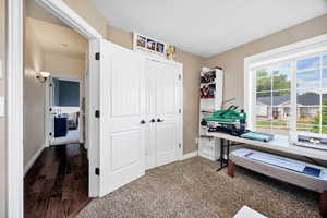 Office/bedroom 2 featuring dark carpet