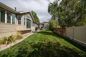 View of fenced backyard