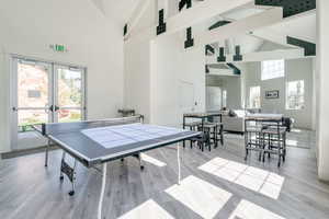 Clubhouse has games table, TV, full kitchen, lounge space and community bulletin board