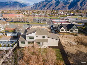 Aerial view of residential area with a mountain backdrop