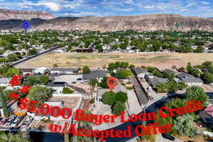 Aerial perspective of suburban area with mountains
