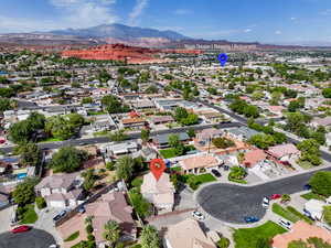 Aerial perspective of suburban area featuring mountains