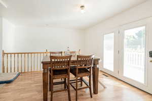 Dining area featuring light wood-style flooring