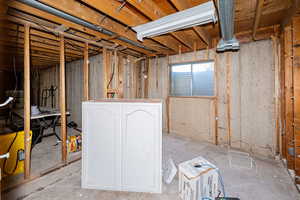 Below grade area with washer / dryer