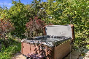 View of yard featuring a hot tub
