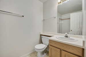 Bathroom with vanity and a shower