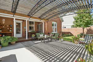 View of patio / terrace featuring a pergola and an outdoor living space