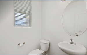 Bathroom with a sink and toilet