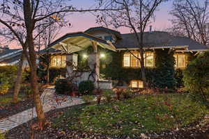 View of front of property featuring a front yard