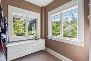 Primary bedroom walk in closet