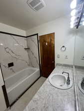 Full bath with vanity and  shower combination