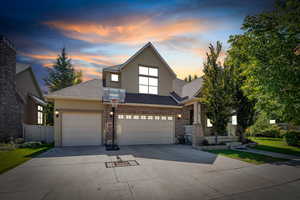 View of front of property at dusk