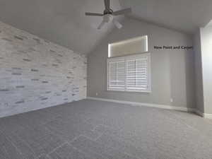 Master bedroom featuring ceiling fan and remote control window covering for additional light control