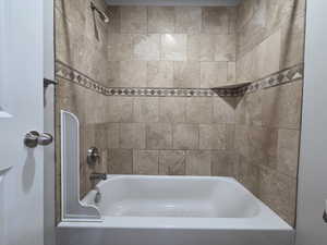 Bathroom with shower / tub combination
