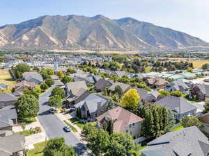 Aerial view of residential area with a mountain backdrop