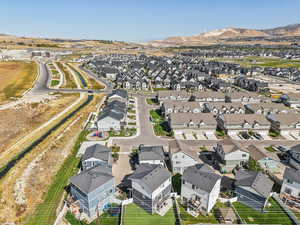 Aerial view of residential area with a mountain backdrop