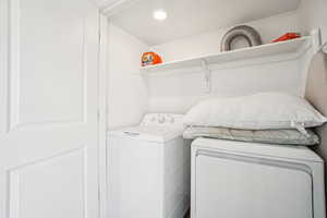 Laundry area featuring independent washer and dryer