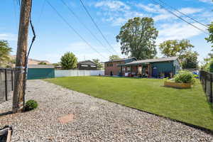 View of fenced backyard