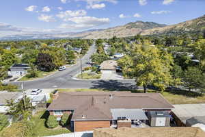 Aerial view of residential area with a mountainous background