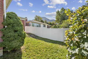 View of yard with a mountain view