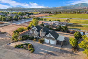 View from above of property with a mountain backdrop