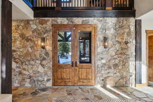 Property entrance with french doors
