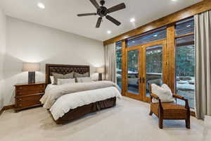 Carpeted bedroom featuring french doors, recessed lighting, ceiling fan, and access to exterior